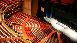 High angle view of the performance hall with over 4000 red seats.