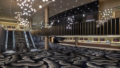 Le lobby du Resorts World est recouvert d'un tapis noir à larges motifs et surmonté de chandeliers globe.